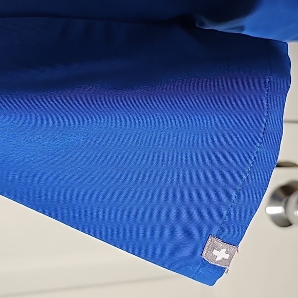 FIG, scrub top blue size small. V neck. One pocket. - Picture 3 of 6